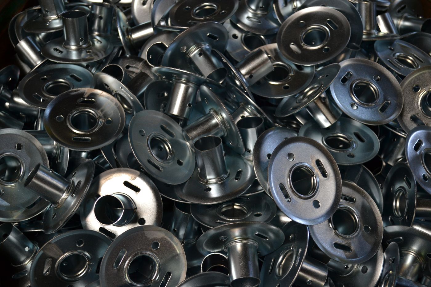 Pressed metal components